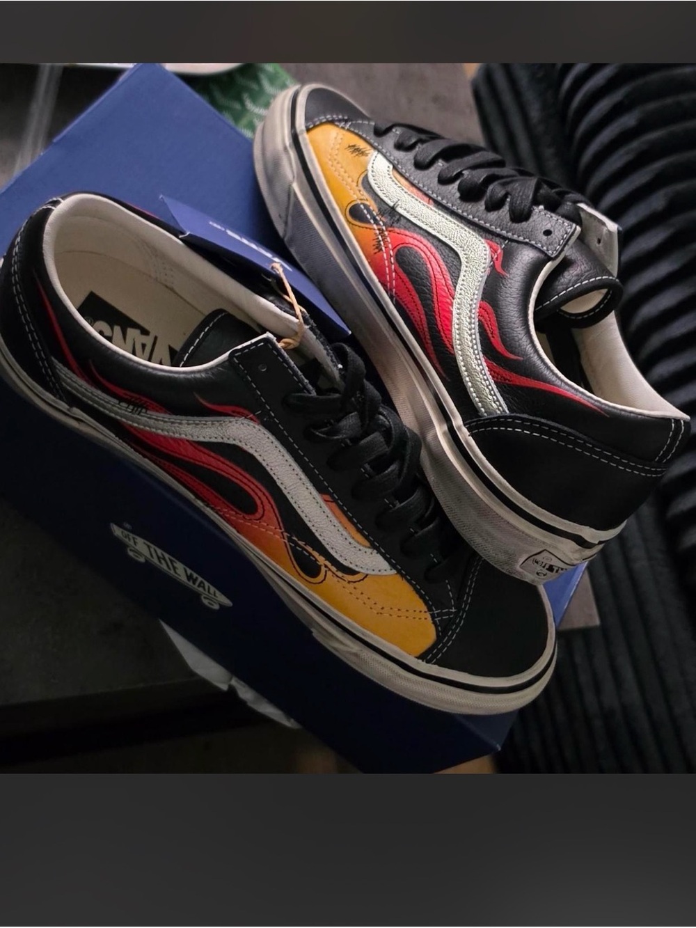 Vans Old Skool Low Top Sneakers in Black with Yellow & Red Flame Detail